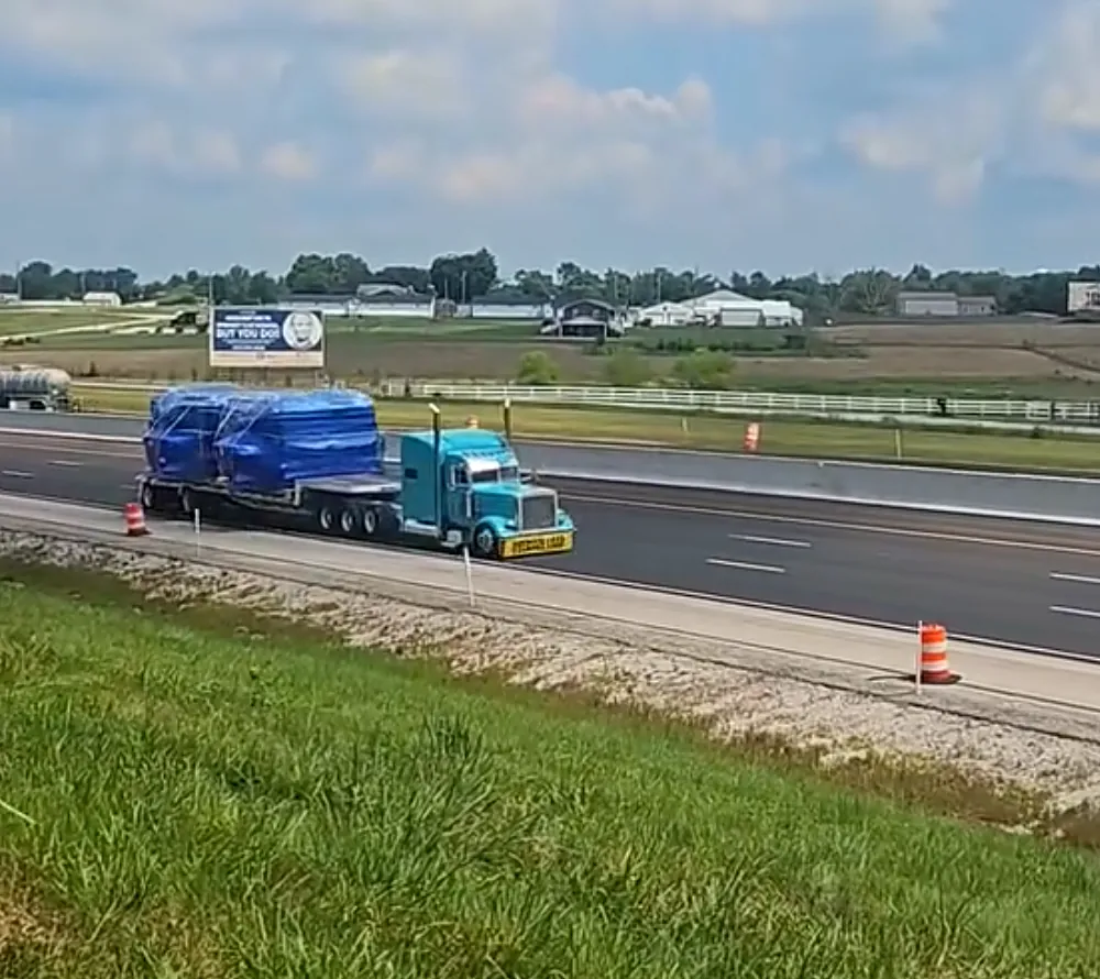 Travis G. Miller trucks on the interstate