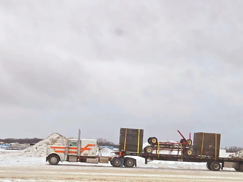 Flatbed truck working in winter conditions